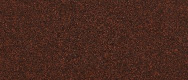 a Carmarthen brown quartz countertop surface that features a dark design with reddish-brown tones