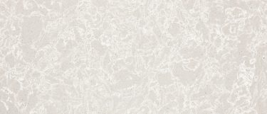 a Big Sur Mist quartz countertop surface that features white swirls over the warm beige background