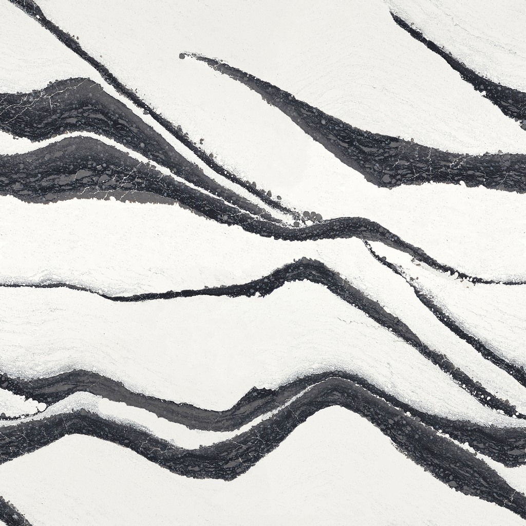 a Bentley quartz countertop surface that features bold veins in black and charcoal with light gray spatters over the white background