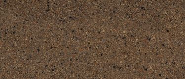 an Ashford quartz countertop surface that features a brown design with specks of black and cream
