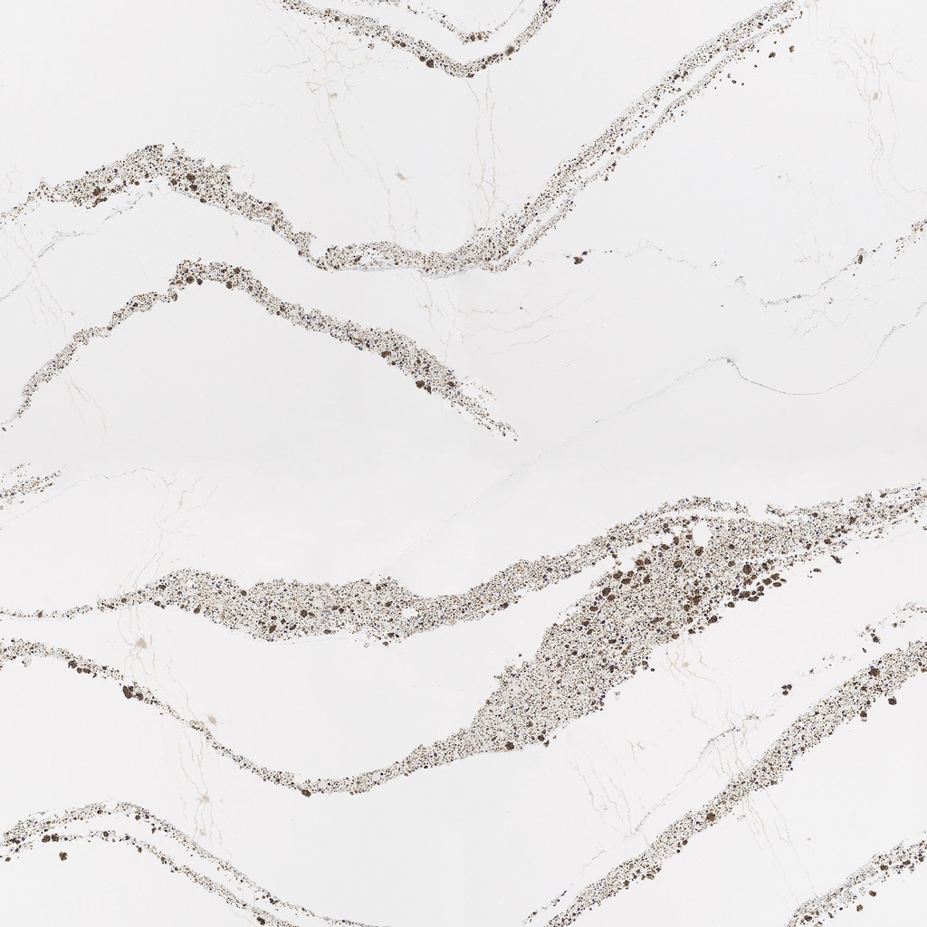 an Annicca quartz countertop surface that features gray speckled veins over the white background