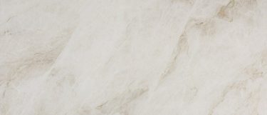 a taj mahal granite countertop surface that has neutral tones with a beige cream finish and gold veins