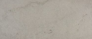a white egeo granite countertop with subtle gray veining over the grayish white surface