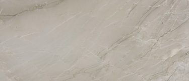 a Gabana granite countertop surface that featires white, gold, and green veins over the ivory cream background