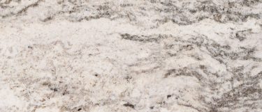 a White Valley Granite countertop with striking gray veining against a warm white background