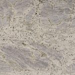 a stone countertop surface with vein and small specks pattern