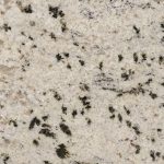 a white storm granite countertop with dark veins and specks against its cool white background