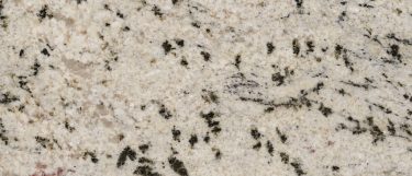a white storm granite countertop with dark veins and specks against its cool white background