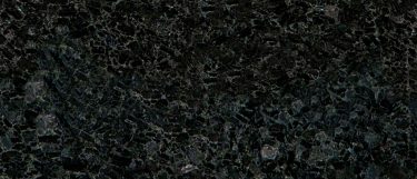 a volga blue stone countertop surface that features a midnight blue background with light gray and blue accents throughout