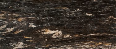 a titanium granite countertop surface that has swirls of beige and white and veins of gray and black