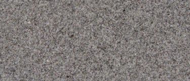 a silvestre gray granite countertop surface that has a grainy design in gray tones