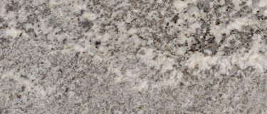 a silver falls granite countertop surface that features light grays blended with darker gray tones