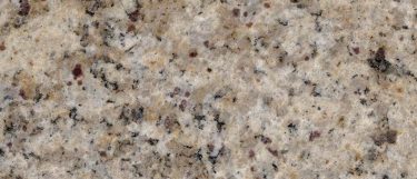 a santana granite countertop surface that features creamy white and burgundy in its design