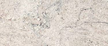 a salinas white countertop surface that has a snowy white base and gray speckles