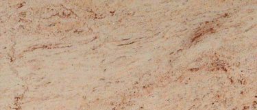 a raja pink granite countertop surface that has a pink shade with white and gray veining