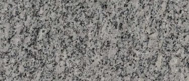 a Gray Atlantico granite countertop surface that blends shades of gray in speckled grainy pattern