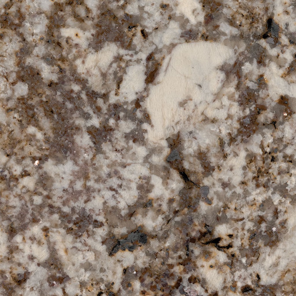 a Desert Beach granite countertop surface that has rich tones of cocoa over the cream white background