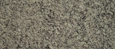 a Bianco Frost granite countertop surface that features dramatic white veins with specks of deep red over the soft white background