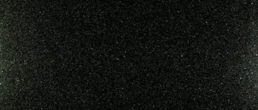 an uba tuba granite countertop surface that features specks of colors over its dark background