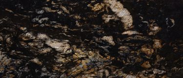 tambora tide granite countertop surface that has a cool gray color scheme with patterns of black, gold, and white textures