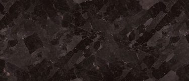 a Marron Cobia granite countertop surface that has flecks of grays and black