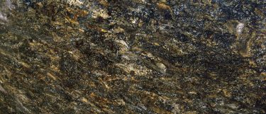 a Cosmos granite countertop surface that features gray and brown color with black detail accents
