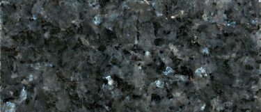 a Blue Pearl granite countertop surface that features a grayish-blue color with glimmering in the shades of beige, gray, and blue