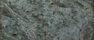 a sienna bordeaux granite countertop surface that has silver and gold veins blended over its brown, cream, and beige tones