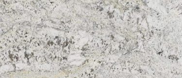 a Bianco Petra granite countertop surface that features gray and taupe details with cream accents over thee white background