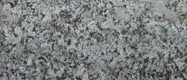 a Bianco Antico granite countertop surface that features warm taupe and pink fleck details over the soft gray background