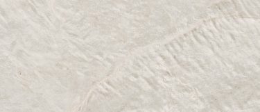 a Liquid Shell sintered stone countertop surface with a pearl and off-white color that has a soft ripping pattern