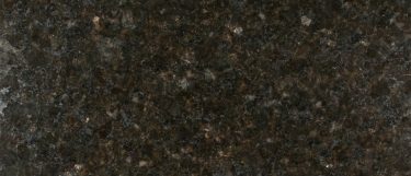 an ubatuba granite countertop surface that features black, gold, gray, and green speckles over its dark green base