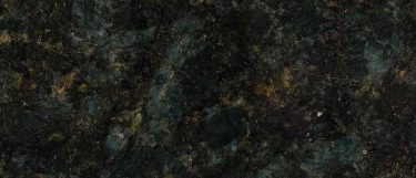 a peacock green granite countertop surface that has a deep green color with gold flecks