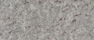 a moon white granite countertop surface that has specks and flecks of burgundy throughout the white stone