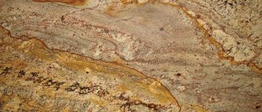 a typhoon bordeaux granite countertop surface that has a brown background with beige and gold veins